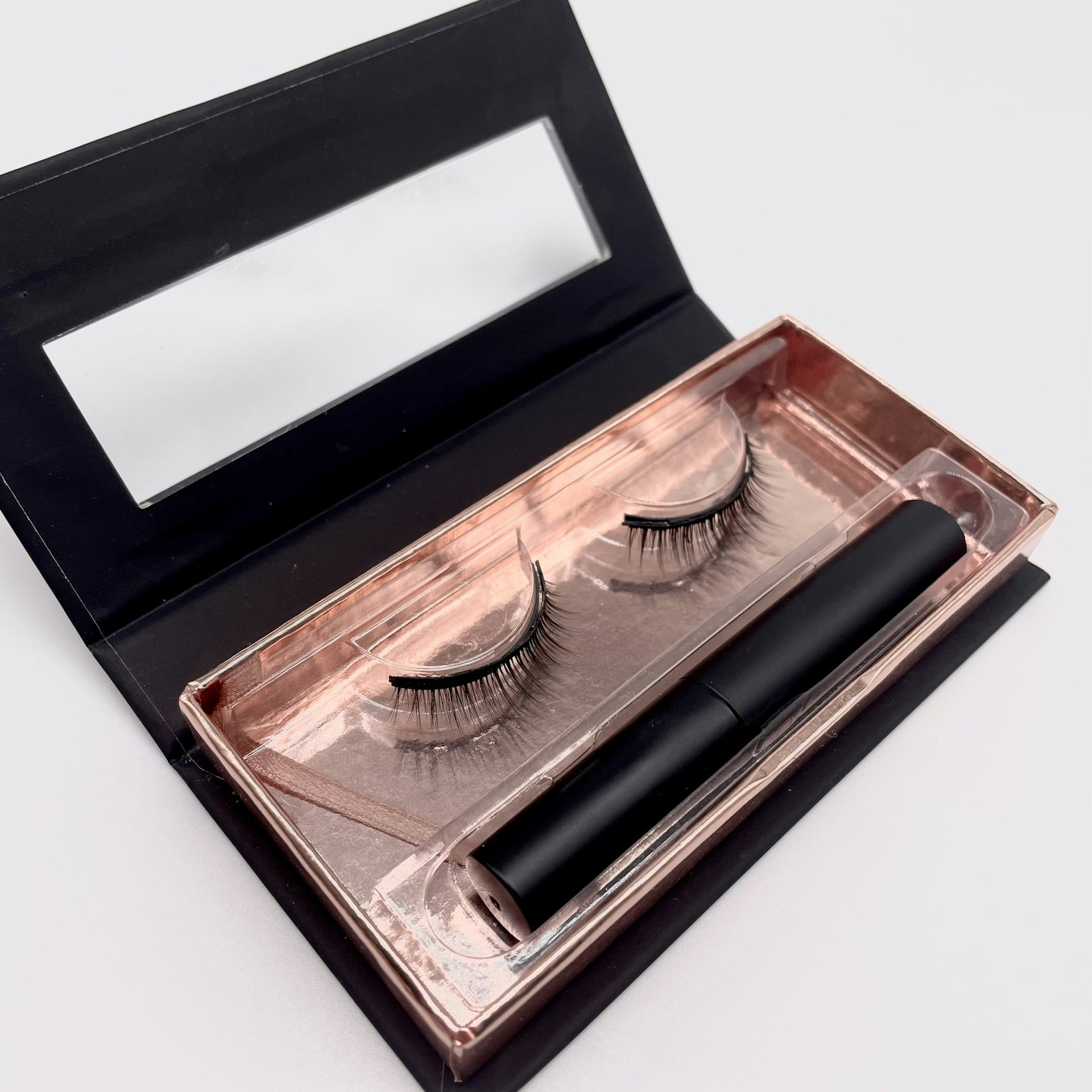 Magnetic eyelashes product on white background